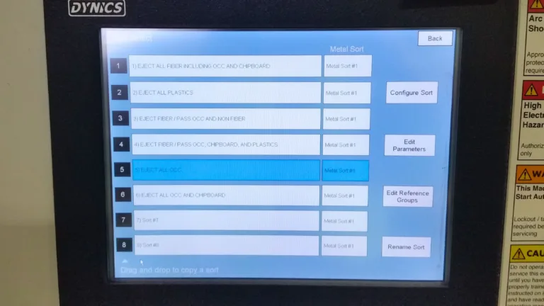 Image of a ipad screen on a metal recycling machine showing the data metric
