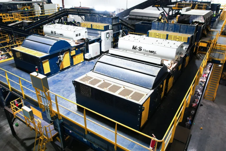 Lakeshore recycling system showing two FiberMax units on a platform.