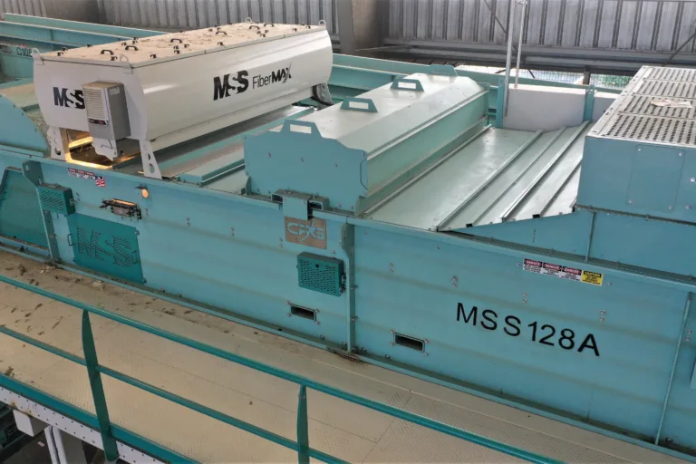 Close up image of a teal MSS FiberMax unit on a platform in a MRF.