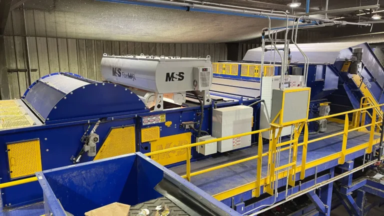 A dark blue FiberMax optical sorter unit in a MRF.