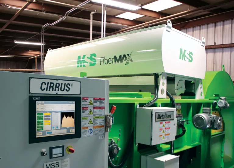 Closeup of a green Cirrus FiberMax unit in a warehouse.