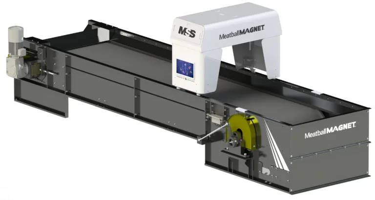 Industrial conveyor with white arch-style magnetic separator labeled "MeatballMAGNET" mounted over a black steel trough.