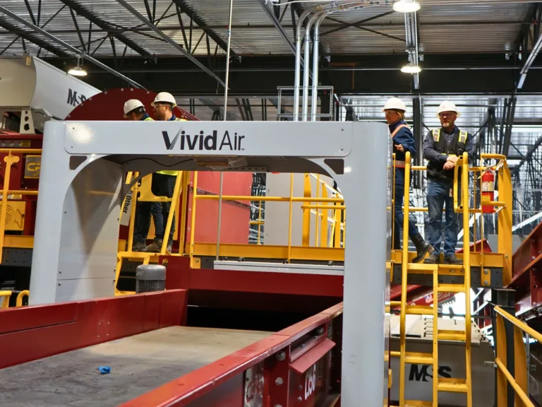 Vivid AI unit in a MRf with workers walking behind.