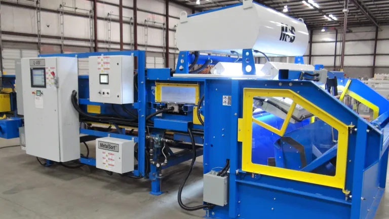 A blue L-VIS scrap sorter in a warehouse