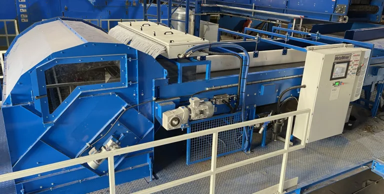 A blue Metal Miner recycling unit in a MRF