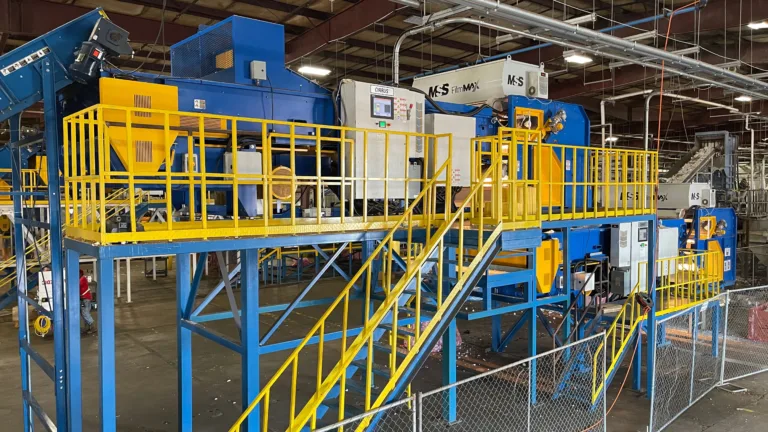 A blue PureFilmMax optical sorting unit on a platform in a MRF